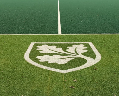 Tufted in school logo